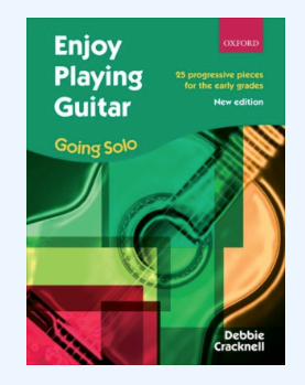Enjoy Playing Guitar Going Solo by Debbie Cracknell